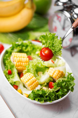Healthy fitness meal with fresh salad. Diet concept.