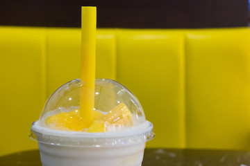 Yogurt pudding with slice of mango