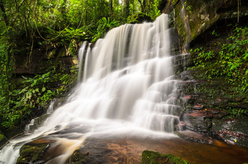 Fototapeta premium Nature landscape of waterfall hidden in the tropical, Thailand