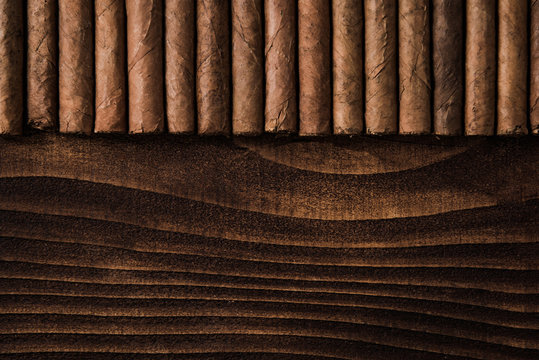 Cuban cigars close up on wooden table
