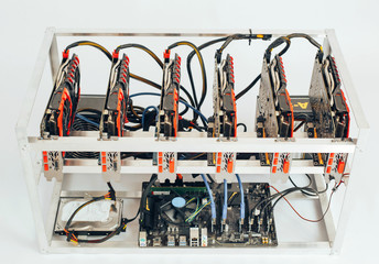 Mining of crypto-currencies. Farm from video cards on a white background