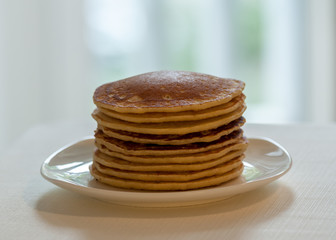 pancakes on light blurred background