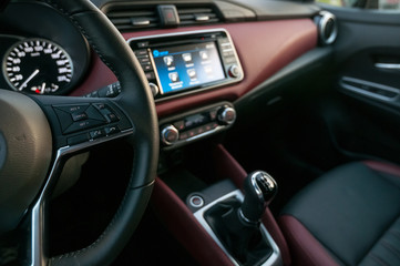 Interior of the new car with infotainment display with touch screen.