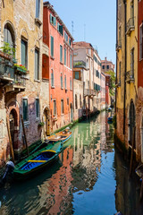 Naklejka na ściany i meble Tourists on water street with Gondola in Venice, ITALY