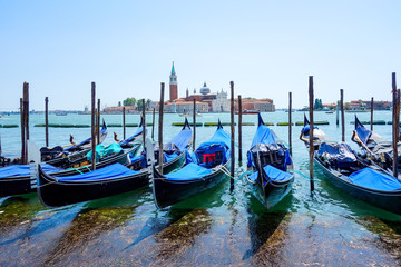 Naklejka premium Tourists on water street with Gondola in Venice, ITALY