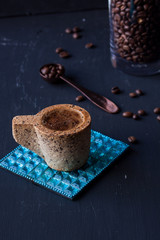 coffee with coffee beans on a black background