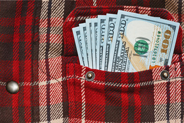 Salary in the work checkered shirt pocket