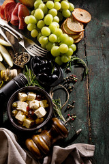 Tasty Italian Greek Mediterranean Food Ingredients Top View on Green Old Rustic Table Above