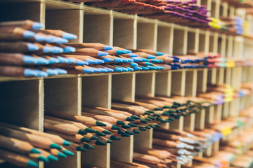 big amount of pencils on the shelf