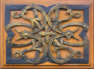 Fragment of baroque metal gate , gold leaf, manual work of blacksmith. Baroque in Europe