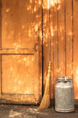 Broom in front of the door - 167807164