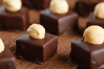Handmade chocolate bonbons with hazelnut