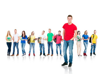 Obraz premium Large group of teenage students isolated on white background. Many different people standing together. School, education, college, university concept.