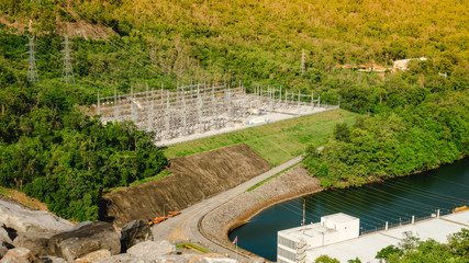 The power station at the Srinagarind Dam the biggest rockfill dam in Thailand on the Khwae Yai river in Kanchanaburi Province. Rockfill dam with nature in asia for background.