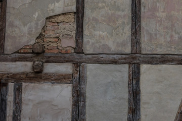 The old brick wall of half timbered house
