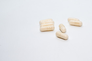 capsule pill of medicine on white background