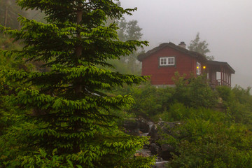 The Norwegian house is shrouded in mist