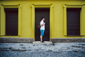 man stand on cit street