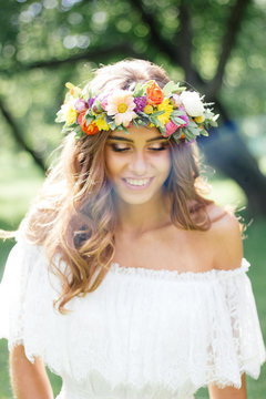 Wedding hair style - bride with flower wreath, bridal event.