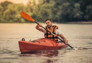 Foto op Canvas Man and kayak © georgerudy