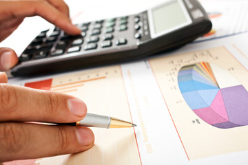 Closeup of a businessman accounting