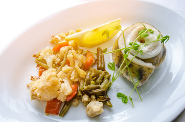 Fried fish fillet roll serve with vegetable