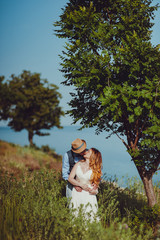 Beautiful bride and groom couple walking at the wedding