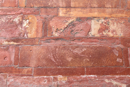 Ancient red sandstone wall of Agra Fort