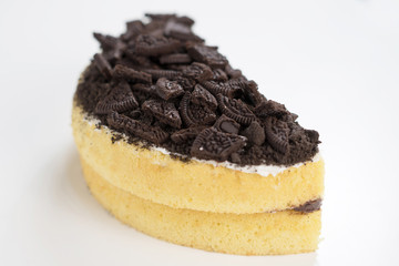 Chocolate cookies oreo cheese cake whole on white dish