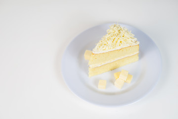 a piece of cheese cake slice on a white plate