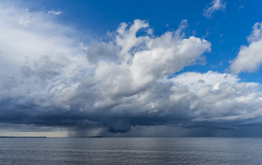 Dark clouds over dark Baltic sea.