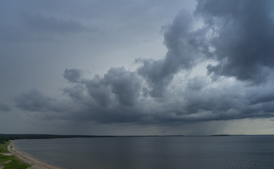 Dark clouds over dark Baltic sea.