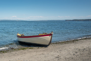 Naklejka na ściany i meble Rowboat on beach