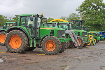 Fototapeta na wymiar Tractors in a yard