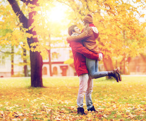 happy young couple meeting in autumn park