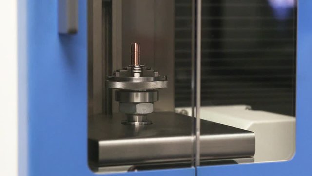 Machine scans bullet in factory