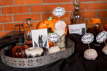 preparing for Halloween. Trick or treat. Happy Halloween concept. Decoration for table - ready for Halloween. Home interior decoration