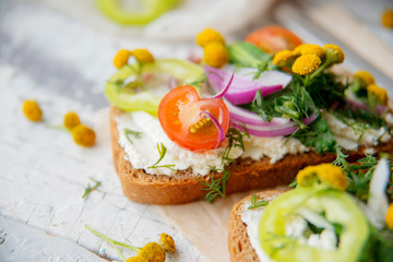 Four sandwiches on the board