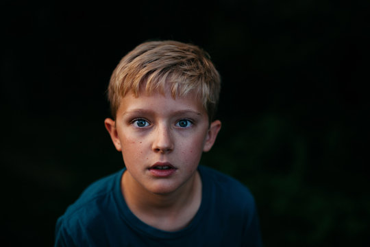 portrait of a wide-eyed boy