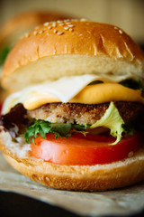 Sandwich hamburger with juicy burgers, cheese and mix of cabbage. Top view