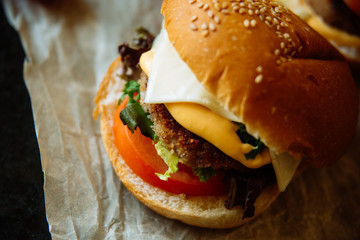 Sandwich hamburger with juicy burgers, cheese and mix of cabbage. Top view