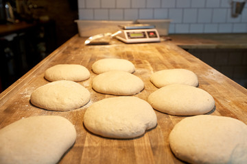 yeast bread dough on bakery kitchen table