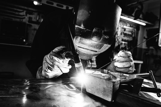 Black and white image of welder