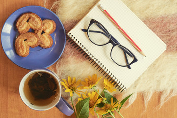 top shot of writer breakfast with notebook