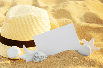 Top view of sandy beach with summer accessories