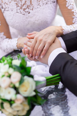 Obraz na płótnie Canvas Close-up of wedding hands with rings
