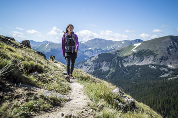 Fototapeta premium Woman Walking in Mountains