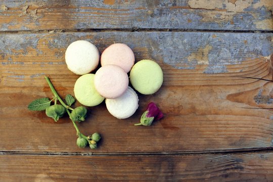 Macaroons on a wooden background