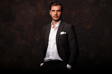 Elegant young handsome man. Studio fashion portrait