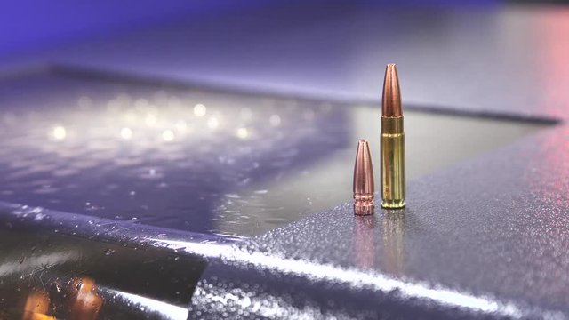 Bullets on ammunition machinery, close up